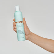 milk-shake-volume-shampoo-in-hand
